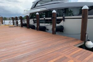 ipe dock with ipe posts and luxury yacht docked